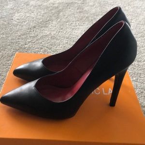 Black pointed toe heel. Size 10
